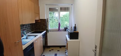 Modern Kitchen with oven, fridge and microwave