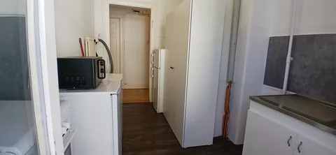 Modern Kitchen with oven, fridge and microwave