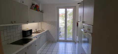 Modern Kitchen with oven, fridge and microwave