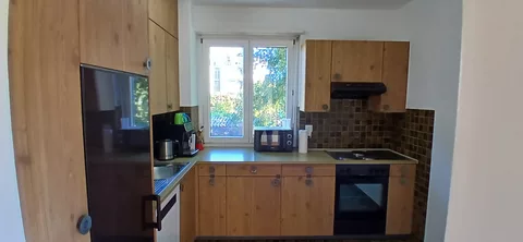 Modern Kitchen with oven, fridge and microwave