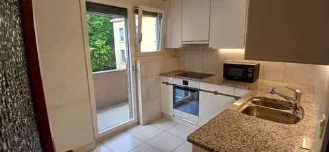 Modern Kitchen with oven, fridge and microwave