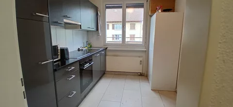 Modern Kitchen with oven, fridge and microwave